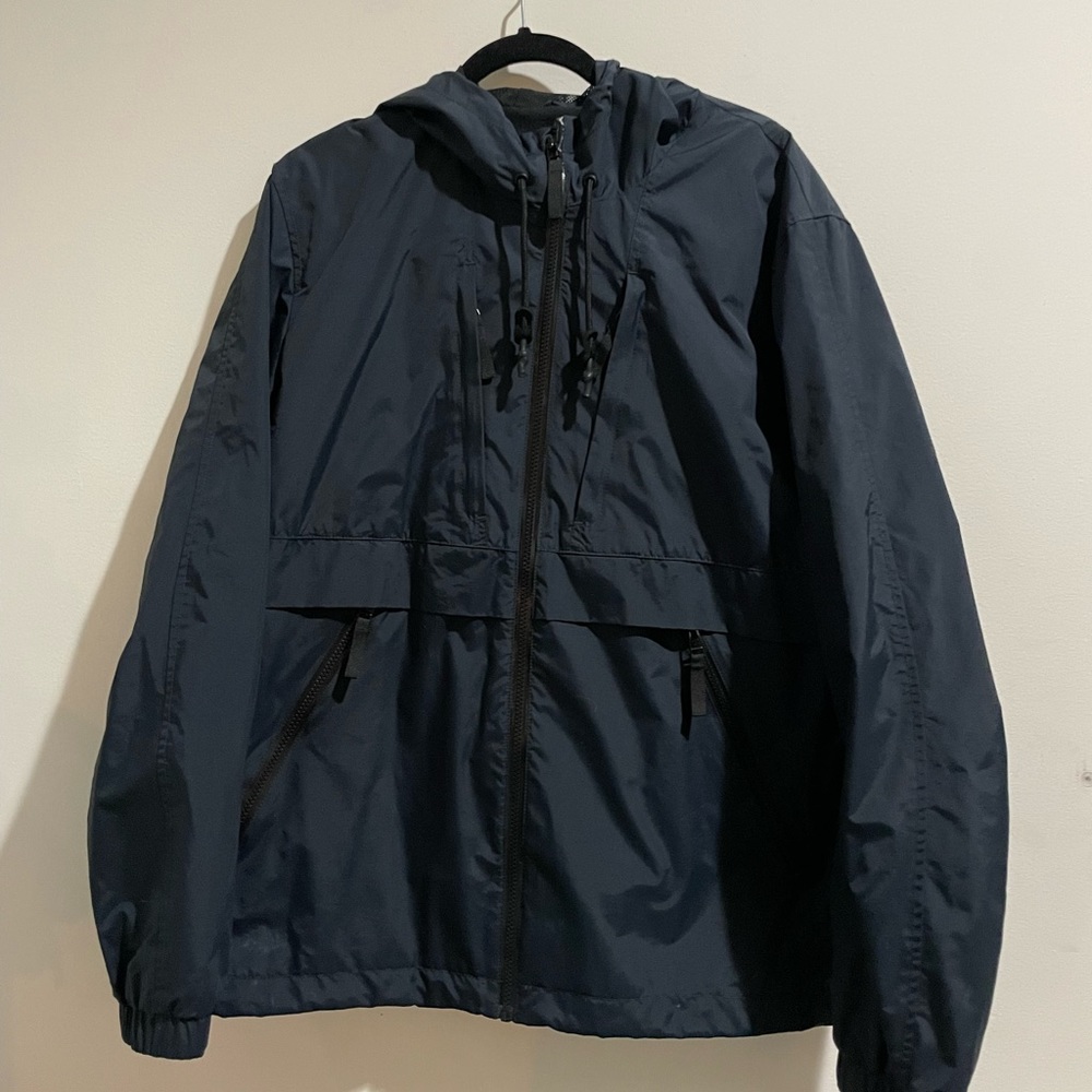 Black windbreaker